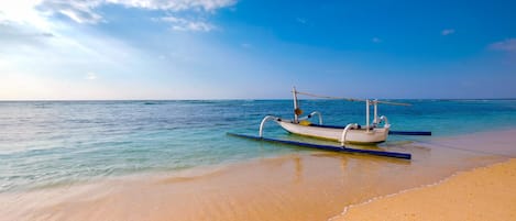 On the beach, white sand