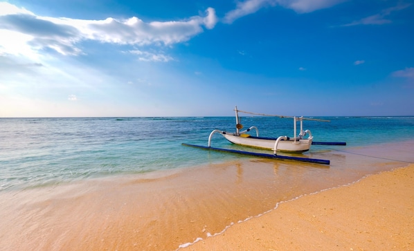 On the beach, white sand