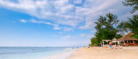 On the beach, white sand