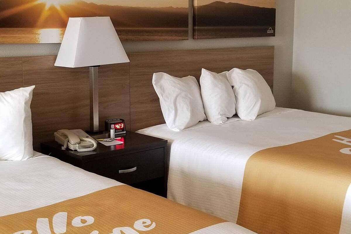 room, 2 queen beds, non smoking | desk, laptop workspace, free cots/infant beds, rollaway beds