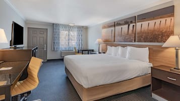 Room, 1 King Bed, Non Smoking | Desk, laptop workspace, free cots/infant beds, rollaway beds