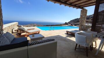 Executive Suite, 2 Bedrooms, Private Pool, Sea View (Nike) | Living area | 55-inch Smart TV with digital channels, TV, Netflix