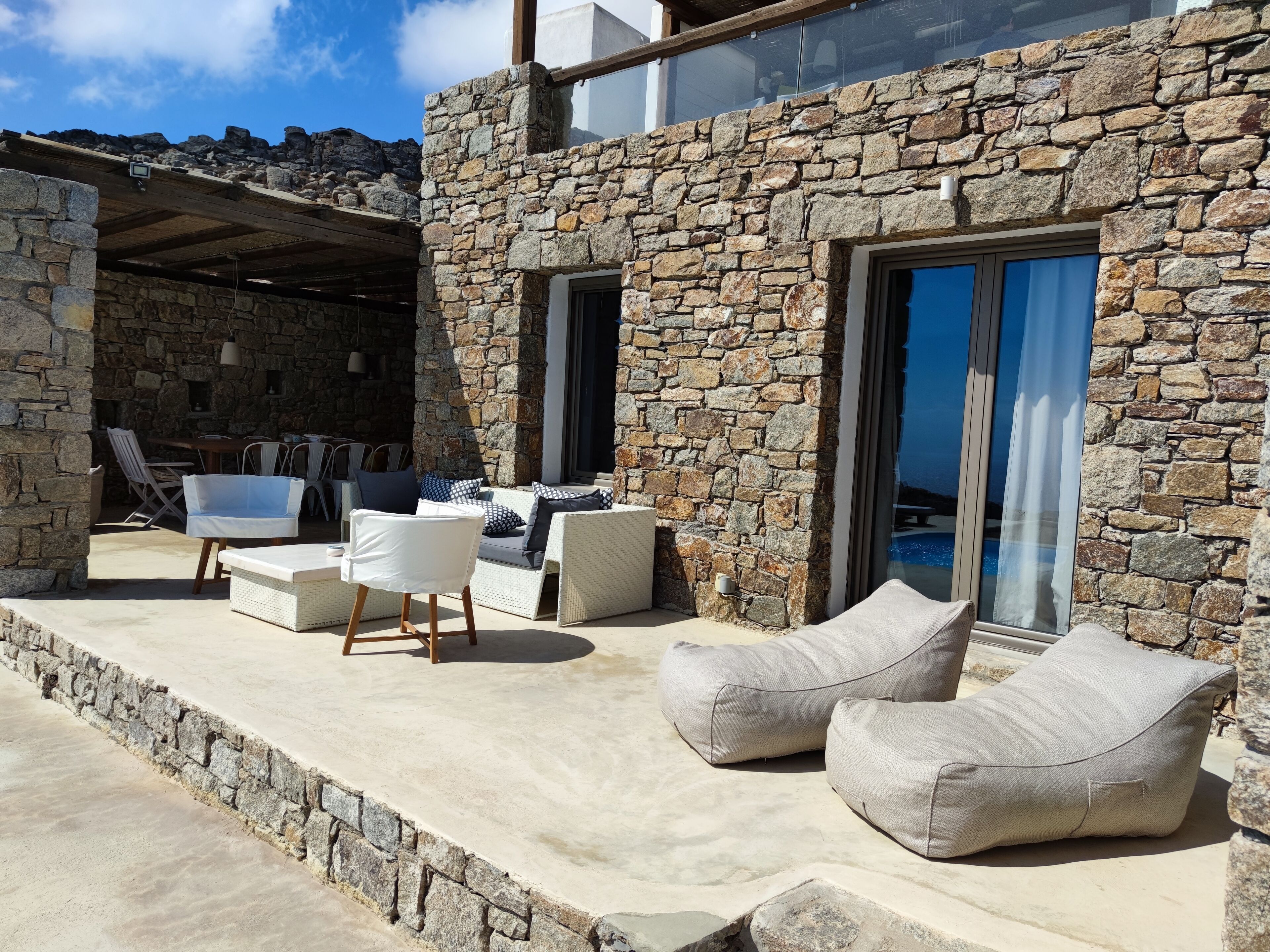 Premier Suite, Pool Access, Sea View (Selini) | Living area | 55-inch Smart TV with digital channels, TV, Netflix