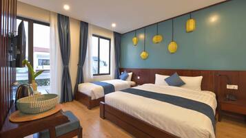 Deluxe Family Room | In-room safe, desk, blackout curtains, soundproofing