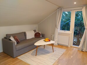 Design-Apartment, Stadtblick | Wohnzimmer