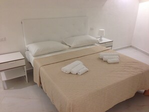 Chambre Deluxe | Coffres-forts dans les chambres, rideaux occultants