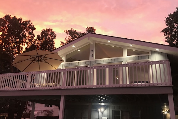 Furnished outdoor deck. There is NOT an umbrella on the deck area.