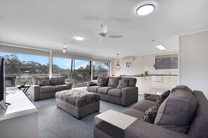 Apartment, 3 Bedrooms, Lake View | Living area | Flat-screen TV - Hybiscus Waterfront Apartments (Lakes Entrance)