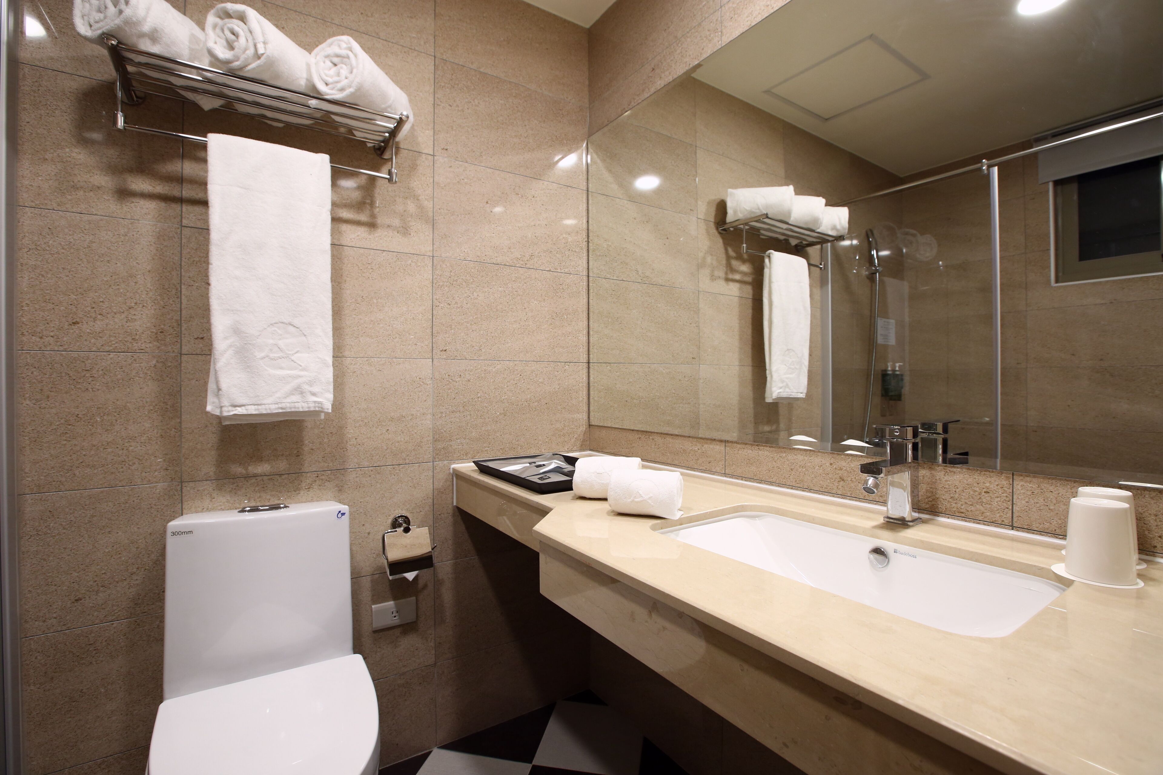 elite quadruple room | bathroom | shower, rainfall showerhead, free toiletries, hair dryer