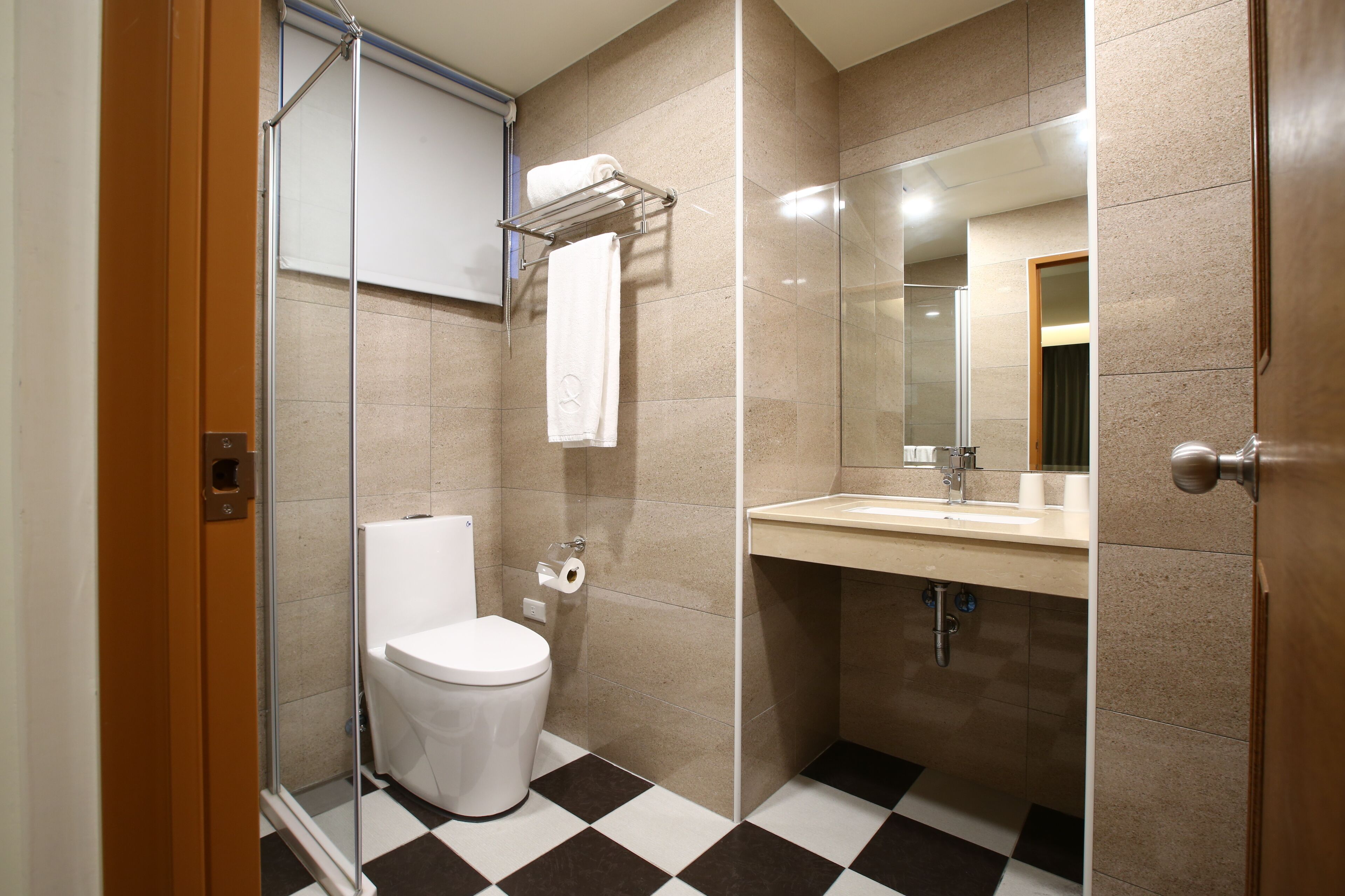 elite suite | premium bedding, down duvets, individually decorated, desk