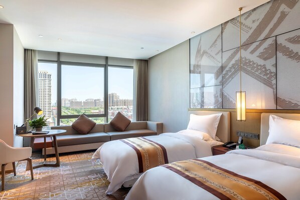 Down comforters, in-room safe, desk, blackout drapes