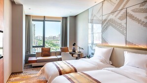 Down comforters, in-room safe, desk, blackout drapes