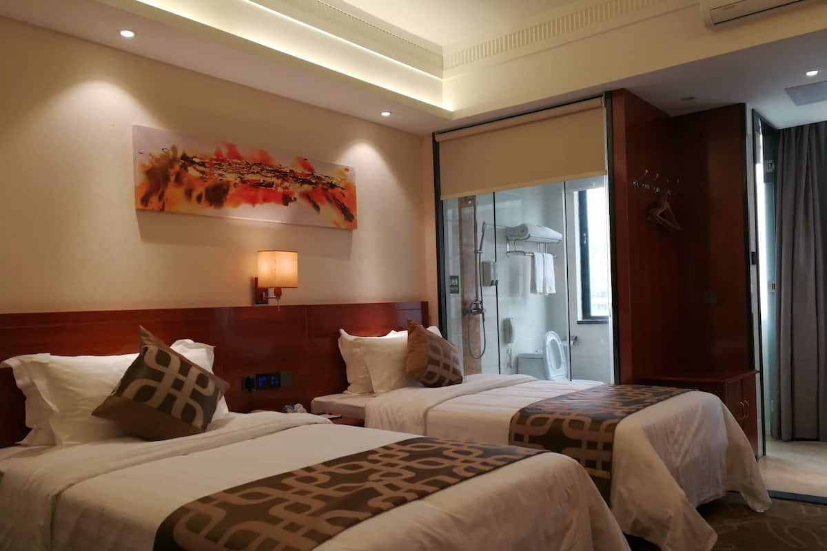 Habitación Premium con 2 camas individuales | Minibar, cortinas blackout, camas extra y wifi gratis