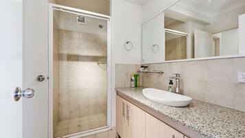 Shower, hair dryer, shampoo