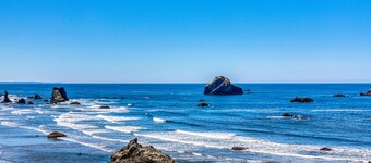 Enjoy sweeping ocean views as you cook & walk to the beach