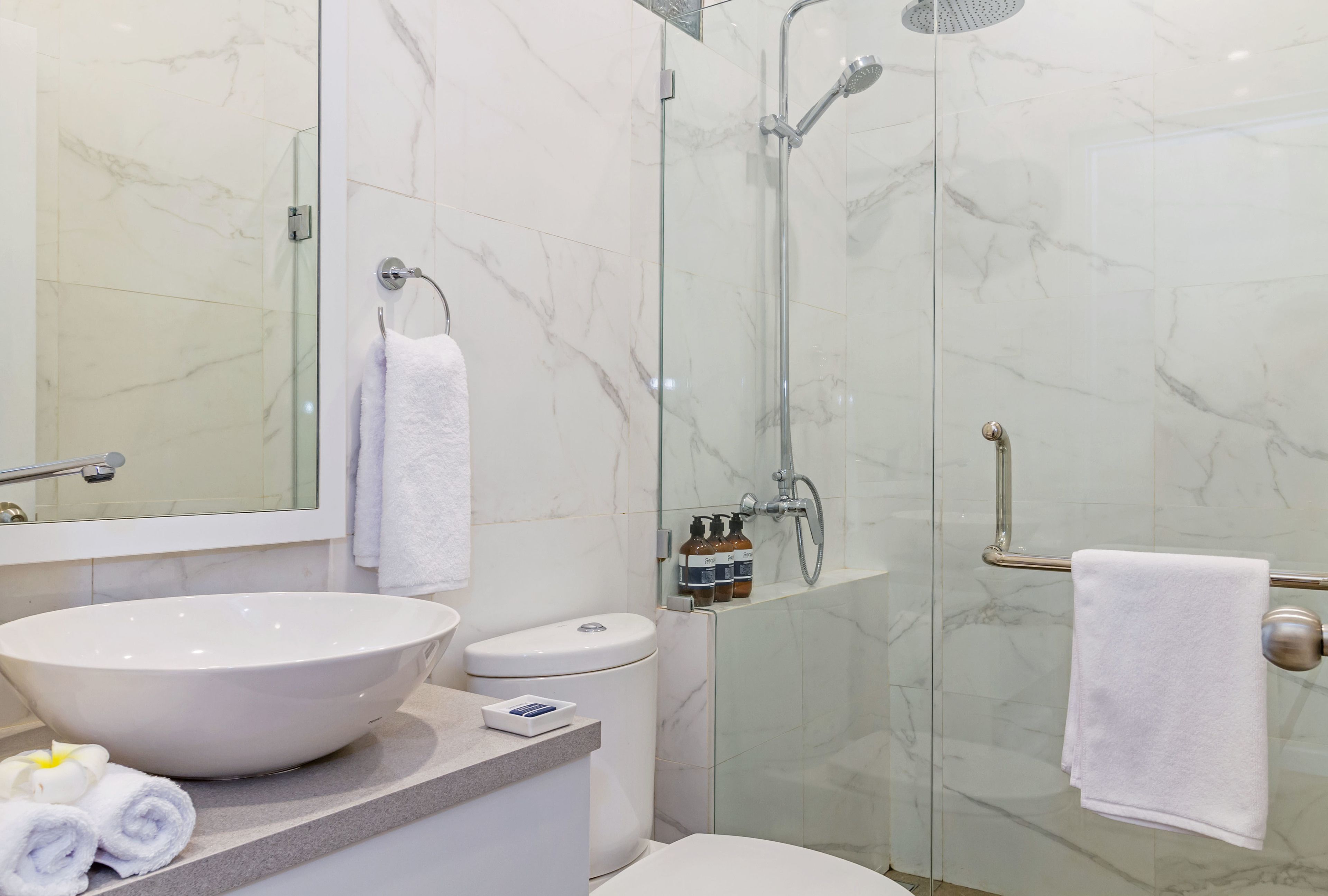 deluxe room, terrace, pool view | bathroom | shower, hair dryer, slippers, towels