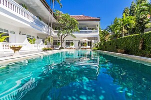 Outdoor pool, open 6:00 AM to 8:00 PM, pool umbrellas, pool loungers