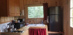 Réfrigérateur, four à micro-ondes, surface de cuisson, cafetiÚre-théiÚre