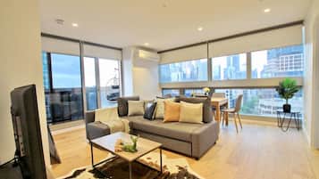 City Apartment, 3 Bedrooms, City View, Tower | Living area | 40-inch flat-screen TV with cable channels, LCD TV, Netflix