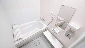 Room 2 KCU | Bathroom | Slippers, towels, toilet paper