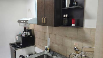 Fridge, microwave, dining tables