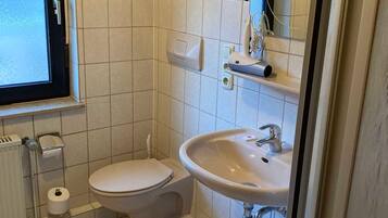 Hair dryer, towels, soap, toilet paper