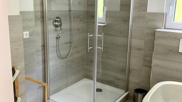 Shower, hair dryer, towels, soap