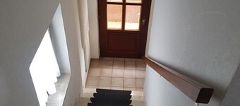 Övre lägenhet i Westeraccum med balkong