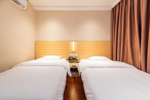 Desk, blackout curtains, free WiFi, bed sheets