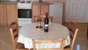 Basic Apartment | Living area | 32-inch LCD TV with cable channels, TV - Laura Apartments (Kamenari)