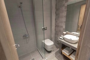 Shower, free toiletries, hair dryer, towels