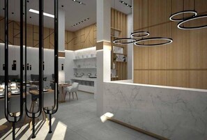Un interior moderno con área de cocina, comedor y barra.