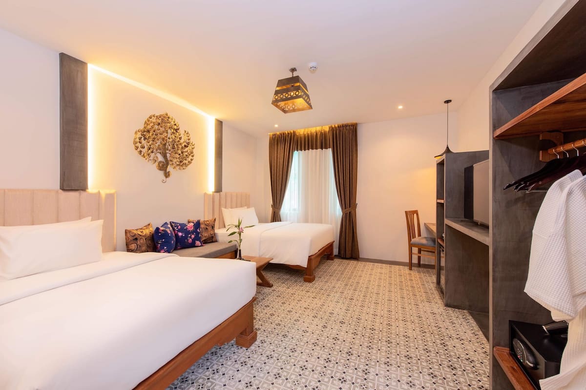 Kamar Twin Junior | 2 kamar tidur, seprai katun Mesir, seprai premium, dan minibar