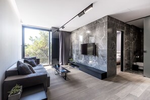 Family Suite, 2 Bedrooms, Hill View (or City View, 402) | Living room | Smart TV