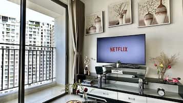 Standard Apartment, 3 Bedrooms | Living area | 32-inch LCD TV with cable channels, TV, fireplace
