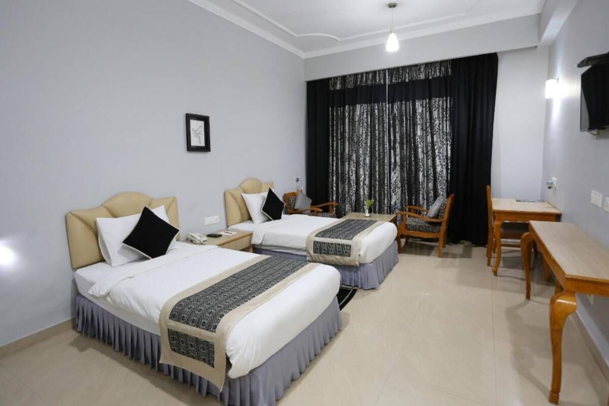 Minibar, blackout drapes, soundproofing, iron/ironing board
