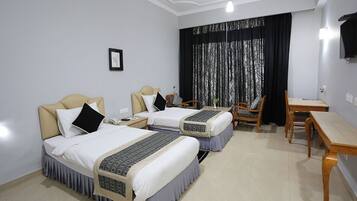 Deluxe Double Room | Minibar, blackout curtains, soundproofing, iron/ironing board