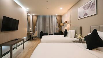 Superior Twin Room, City View | Free minibar items, desk, blackout curtains, soundproofing