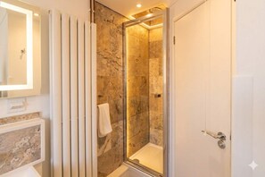Combined shower/tub, hair dryer