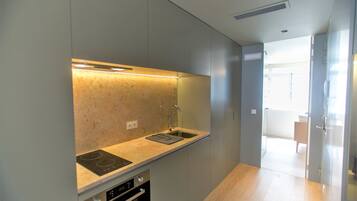Studio, City View (Prime 1) | Private kitchen | Fridge, microwave, oven, stovetop
