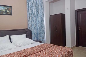 Individually decorated, individually furnished, desk, laptop workspace - Gold Rush Suites (Port Harcourt)