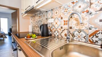 Apartment, 1 Schlafzimmer (5) | Eigene Küche | Kühlschrank, Mikrowelle, Herdplatte, Kochgeschirr/Geschirr/Besteck