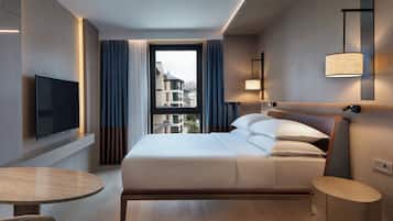 Premium bedding, down comforters, minibar, in-room safe