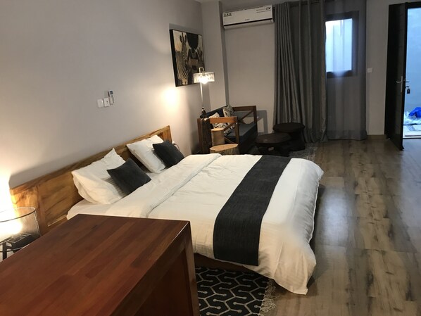 Desk, blackout curtains, free cots/infant beds, rollaway beds