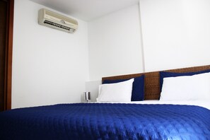 Apartamento | Cofres nos quartos, ferros/tábuas de passar roupa, Wi-Fi de cortesia