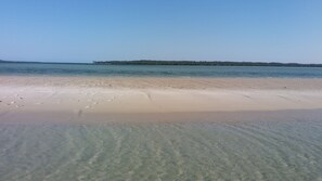 On the beach, white sand