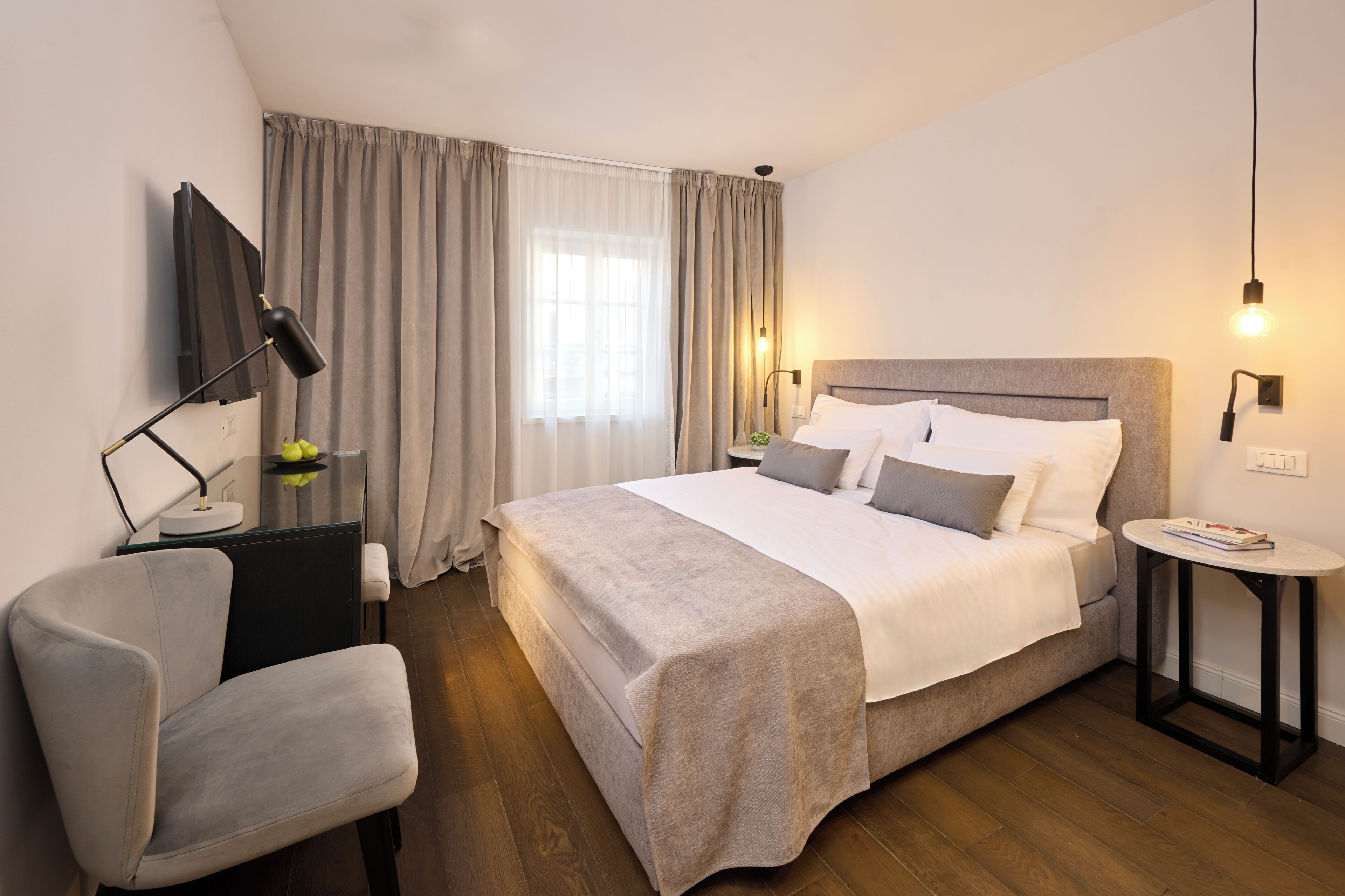 Premium bedding, down duvets, pillow-top beds, in-room safe