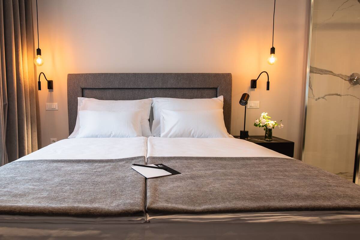 Premium bedding, down duvets, pillow-top beds, in-room safe
