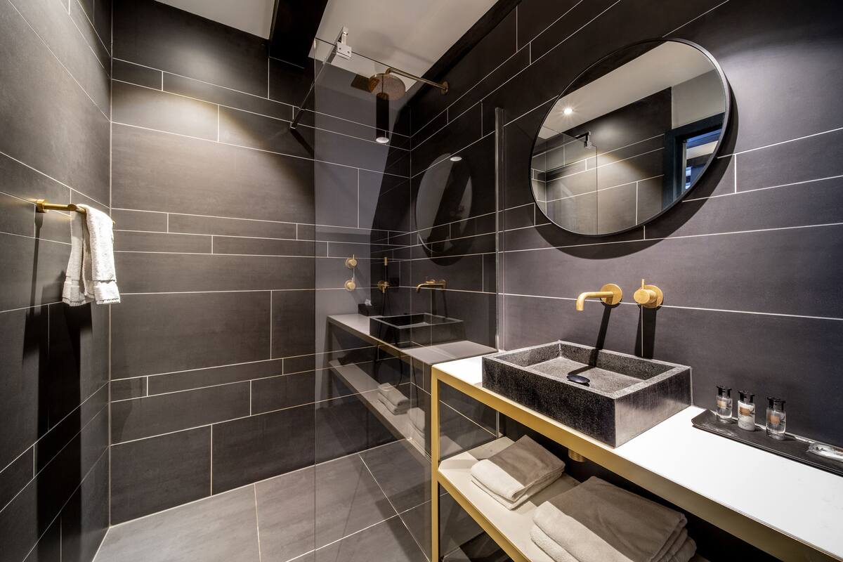 signature room (roald dahl) | bathroom | shower, hair dryer, towels, soap