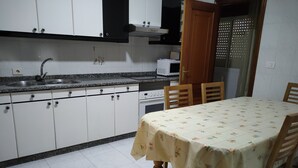 Family Apartment, 4 Bedrooms | Private kitchen | Espresso maker, coffee/tea maker, full-sized fridge, microwave - Apartamento San Antonio (Monforte de Lemos)